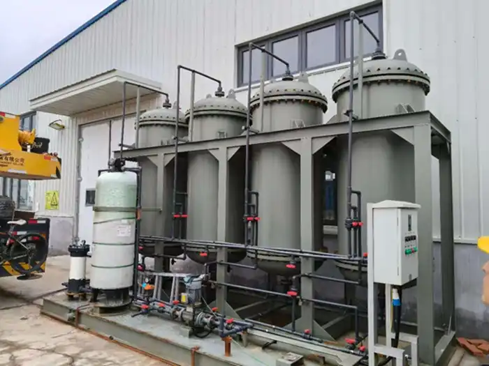 How do adsorption-type oil removal units work for oil spill cleanup?